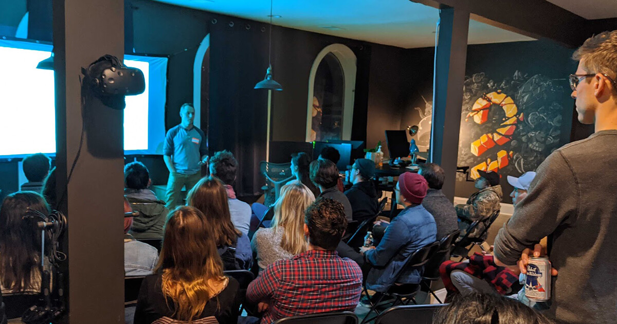 Chattanooga creatives watching a presentation at a community event